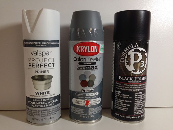 various cans of primer paint