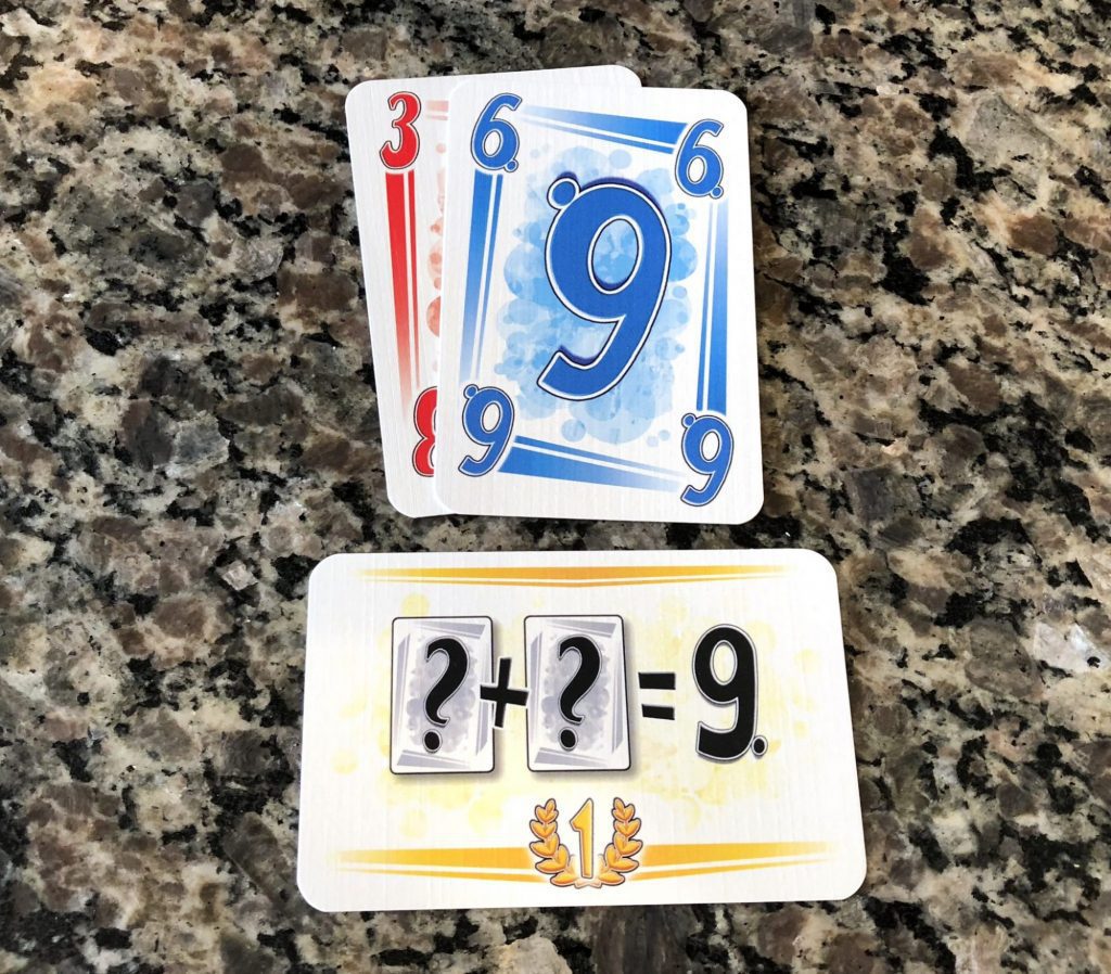 Mission card - two cards of either color which add up to nine.