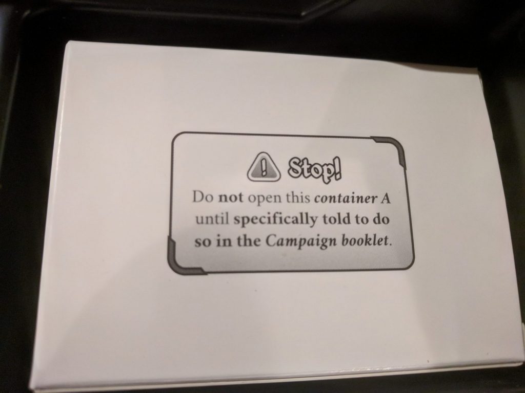 Photo of game container with Stop! text.
