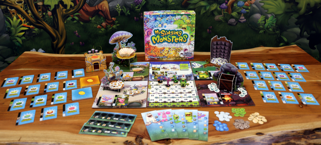 The contents of the My Singing Monsters Kickstarter game. 