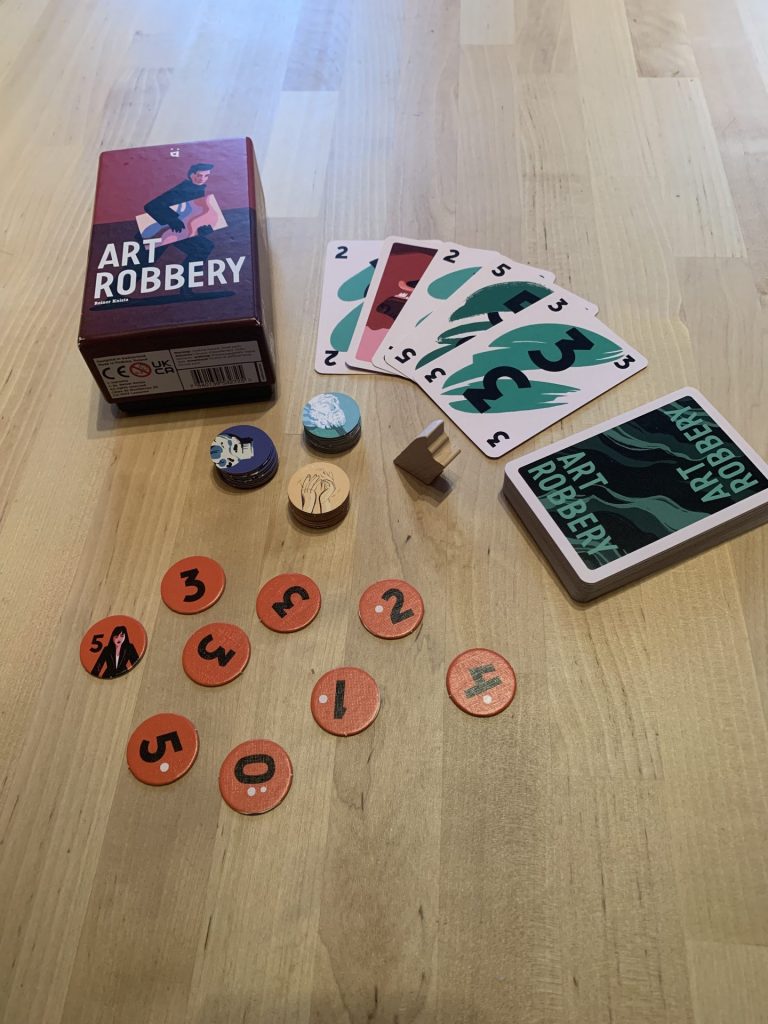 The box for "Art Robbery" with the components laid out.