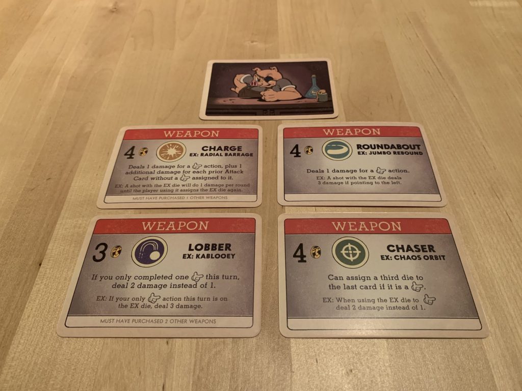 Four upgrade cards on the table.