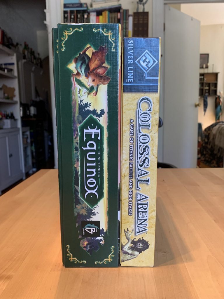 The boxes of Equinox and Colossal Arena side-by-side.