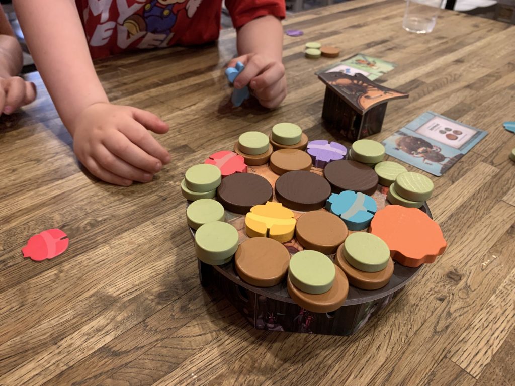 The Kabuto Sumo board, covered with wooden discs, early in a game.