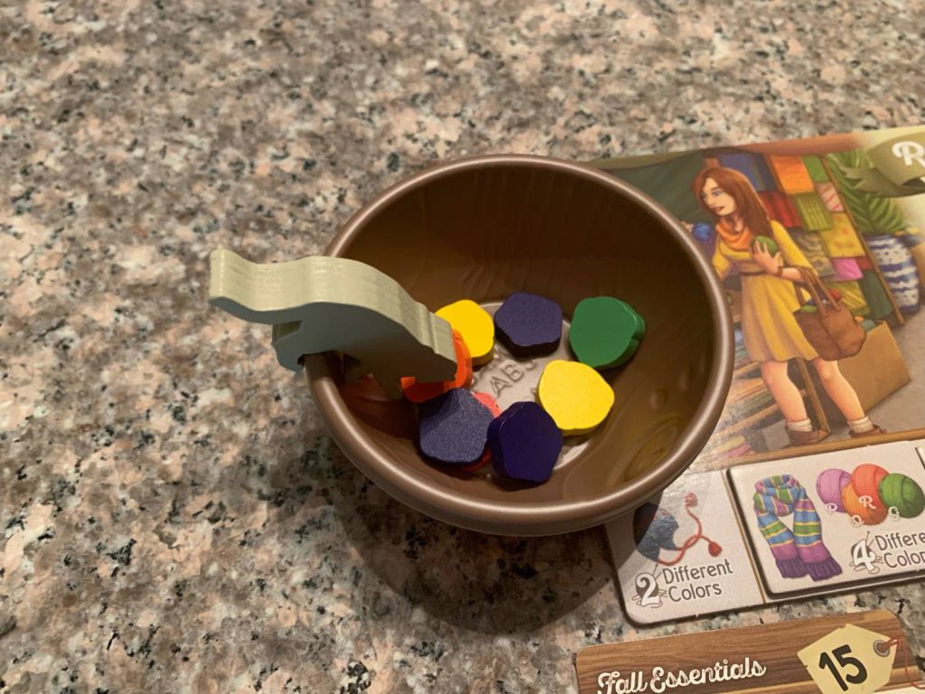 A bowl filled with yarn tokens