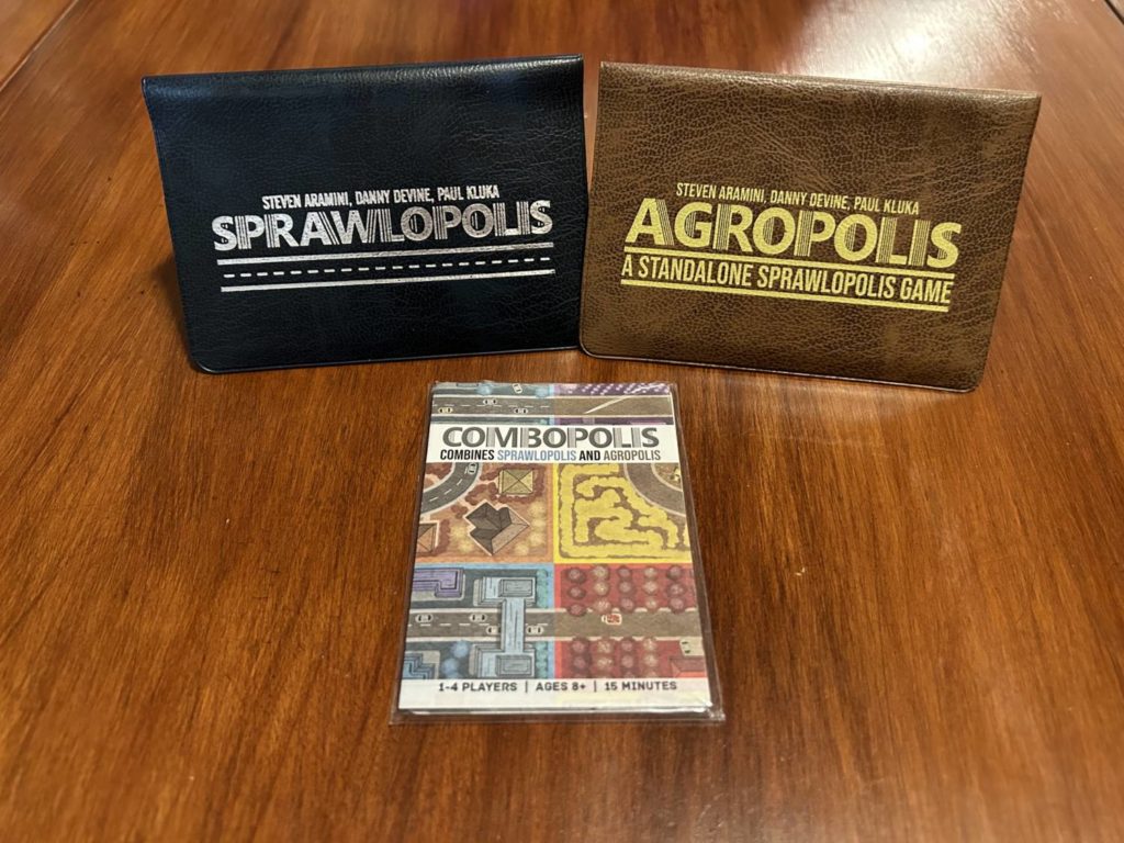 The wallets for Sprawlopolis and Agropolis.