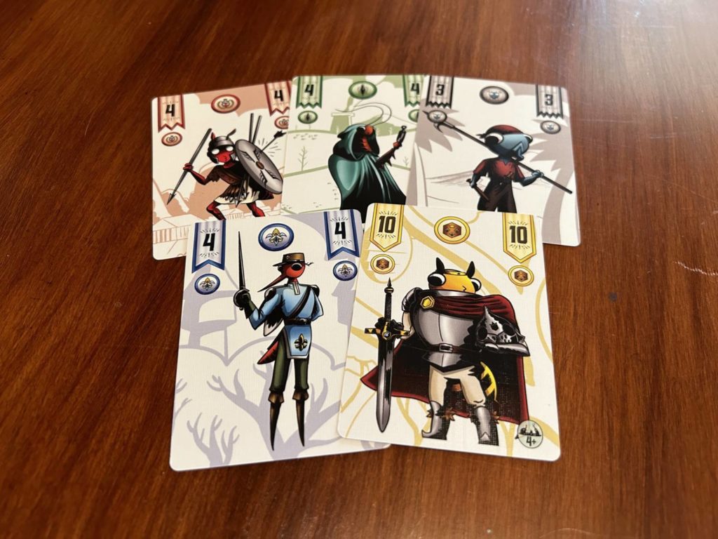 One card in each suit, showing an ant dressed as a Roman centurion, a cockroach as a thief, a fly as a peasant, a mosquito as an infantry officer, and a bee in knight's armor.