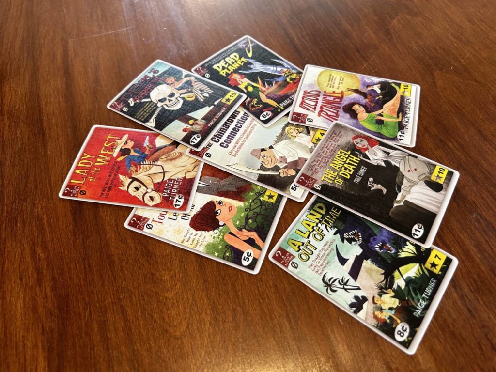 The eight different novel covers that make up the scoring cards.