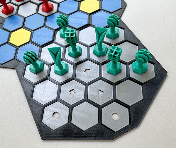 Board with pieces and starting locations
