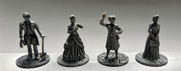Four of the six character minis from the game. In a nice nod to the fact that both men and women will be playing the game, the only instance of male-only activity is the concept of Your Father’s Work. Throughout the game, the actions and occurrences are gender-neutral.