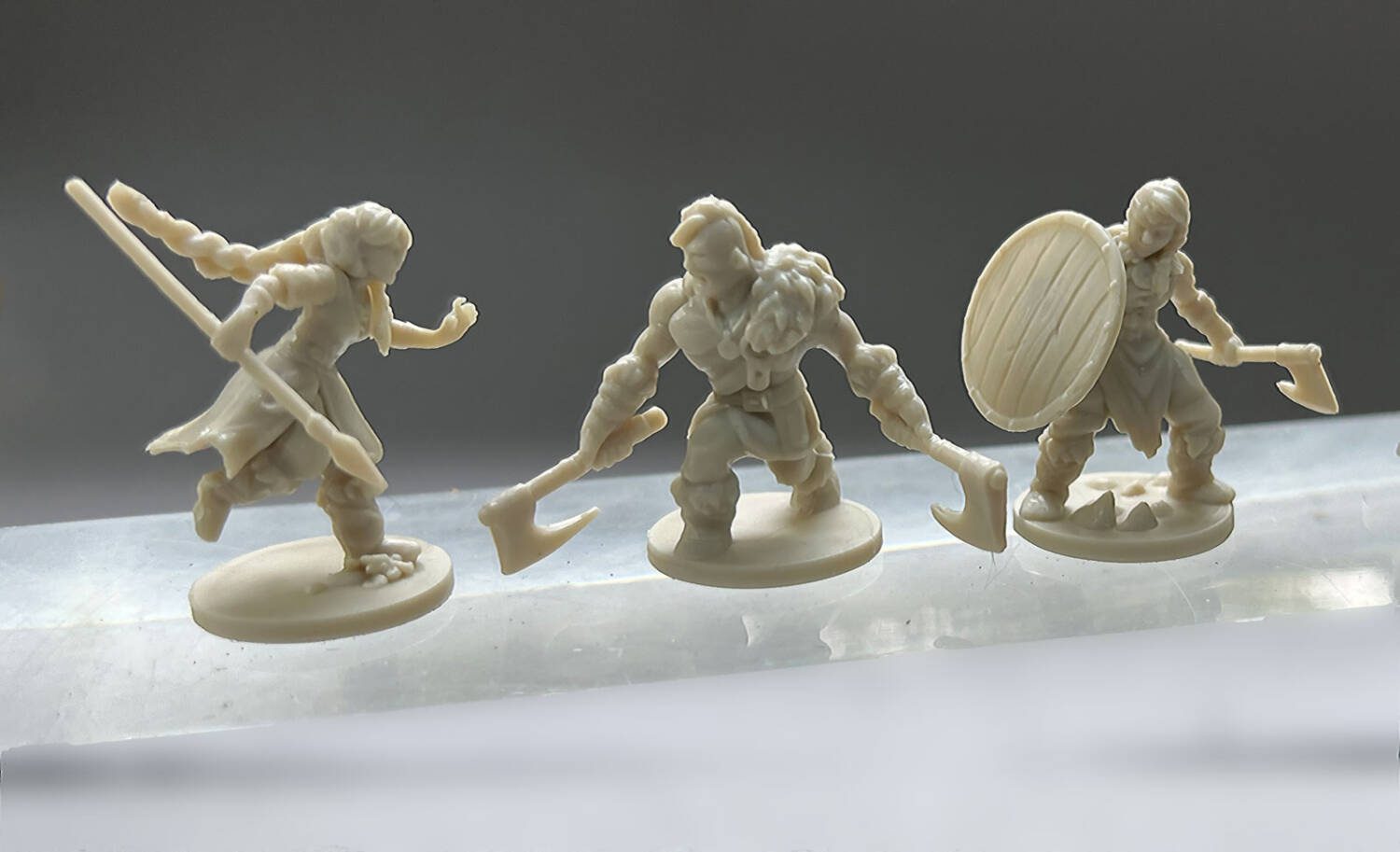 Three of the Warchief miniatures.