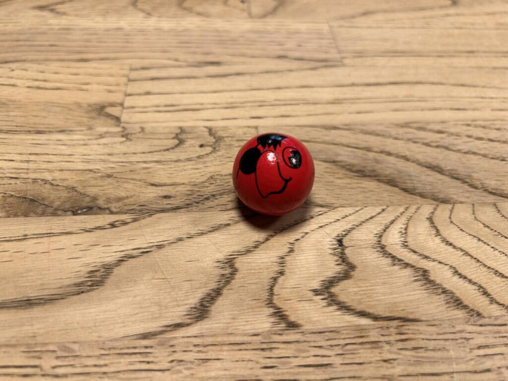 Captain Pepe is painted on a small red ball.