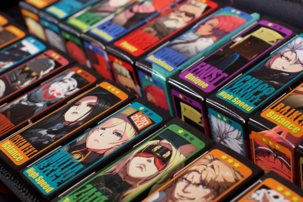 The tuck boxes feature each character's name, picture, and complexity rating on the top of the box, making them easy to peruse.