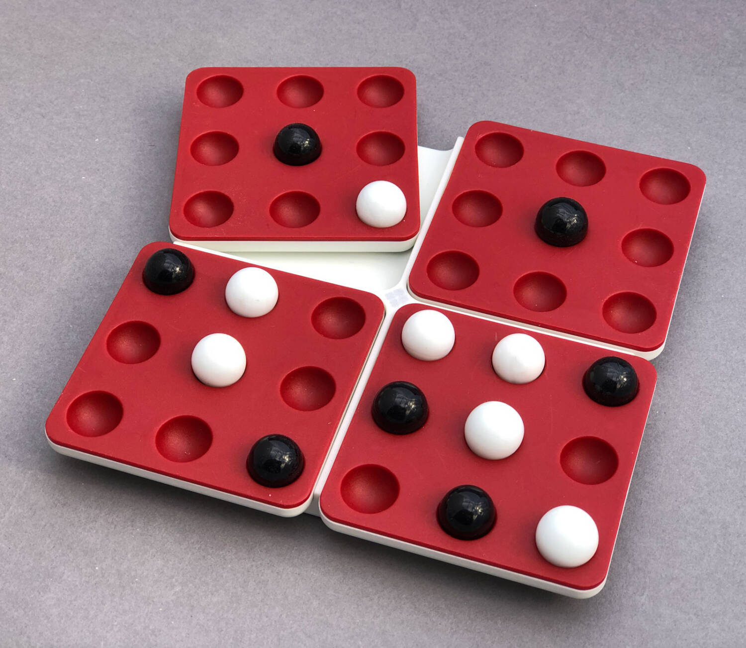 Each quadrant of the Pentago board pulls away from the others. Twisting a section of the board is a required step for each move in the game. 