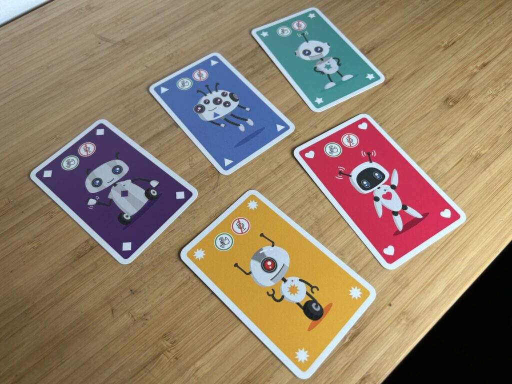 The robots on the cards are made mostly with rounded, white shapes. They're endearing.