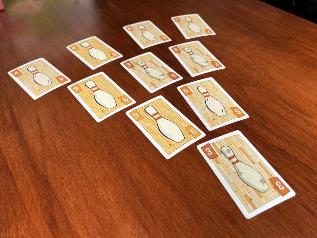 Cards from Bowling Solitaire laid out on the table.