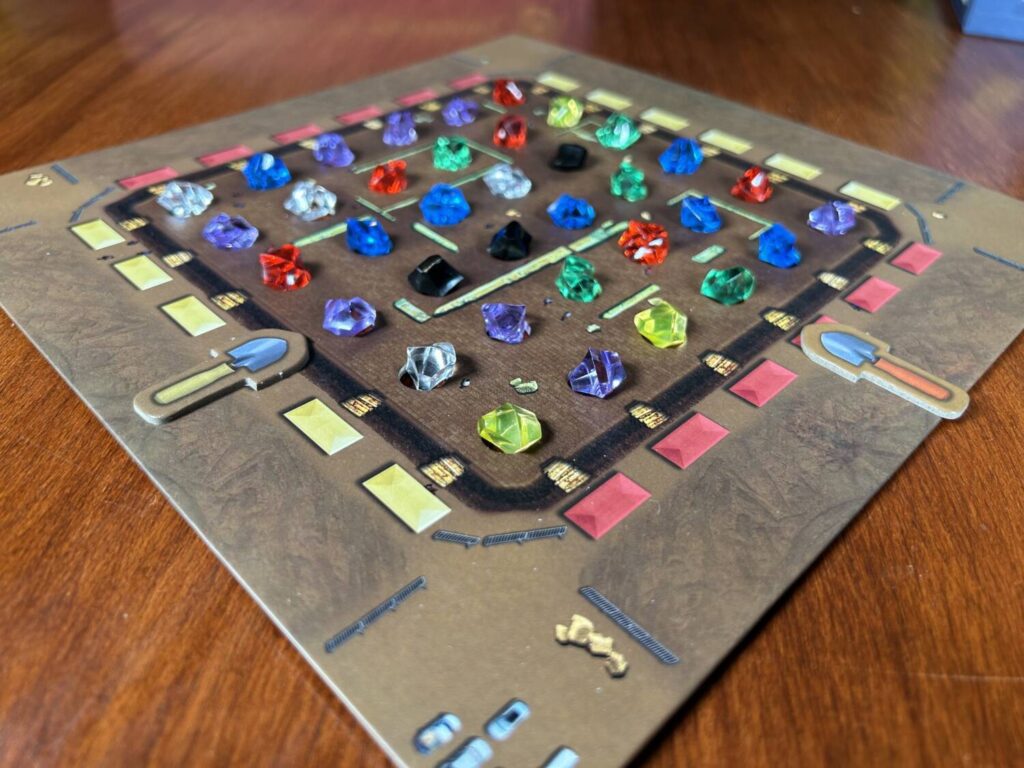 The board for Dig Site, a six by six grid of gems.