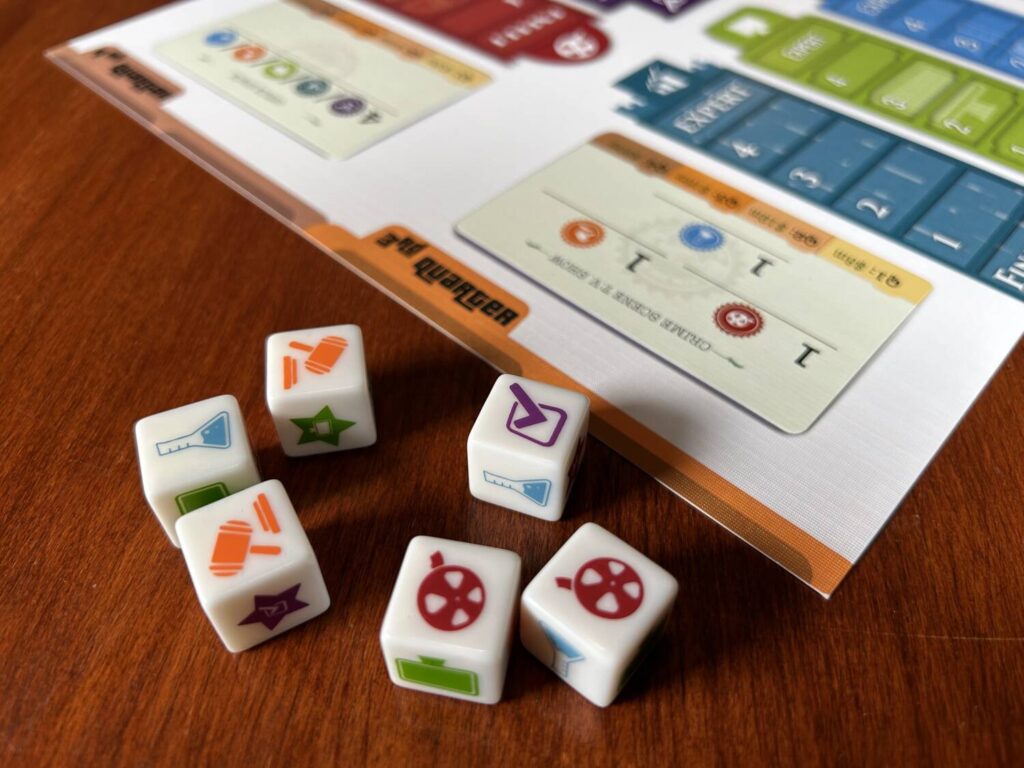 A close up picture of the I'm the Boss dice.