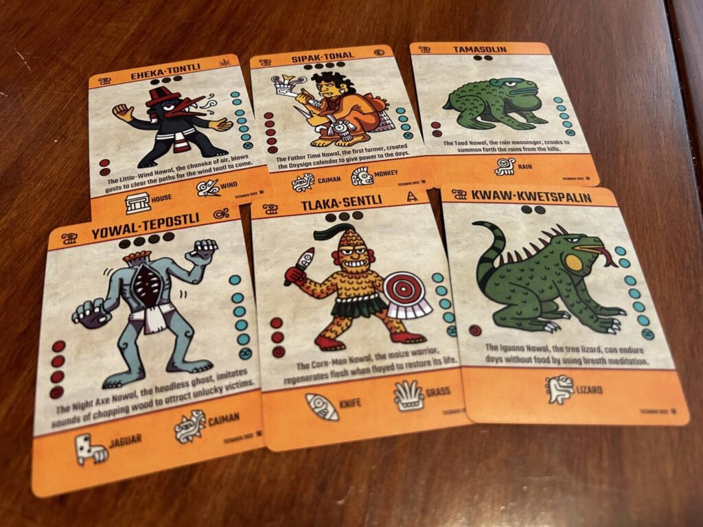 An array of cards. Their ability icons can be seen at the bottom of the card.
