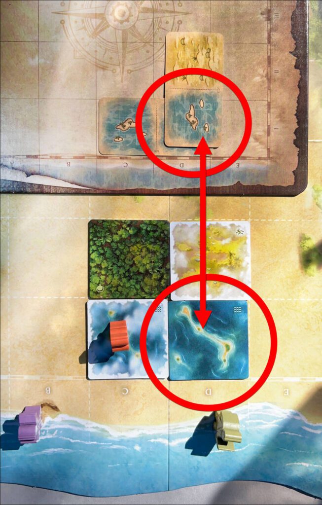 With a second Lagoon Sketch Card being laid over another Lagoon, that square on the main board becomes a Confirmed Lagoon. Flipping the tile to its clear side indicates it has been Confirmed.