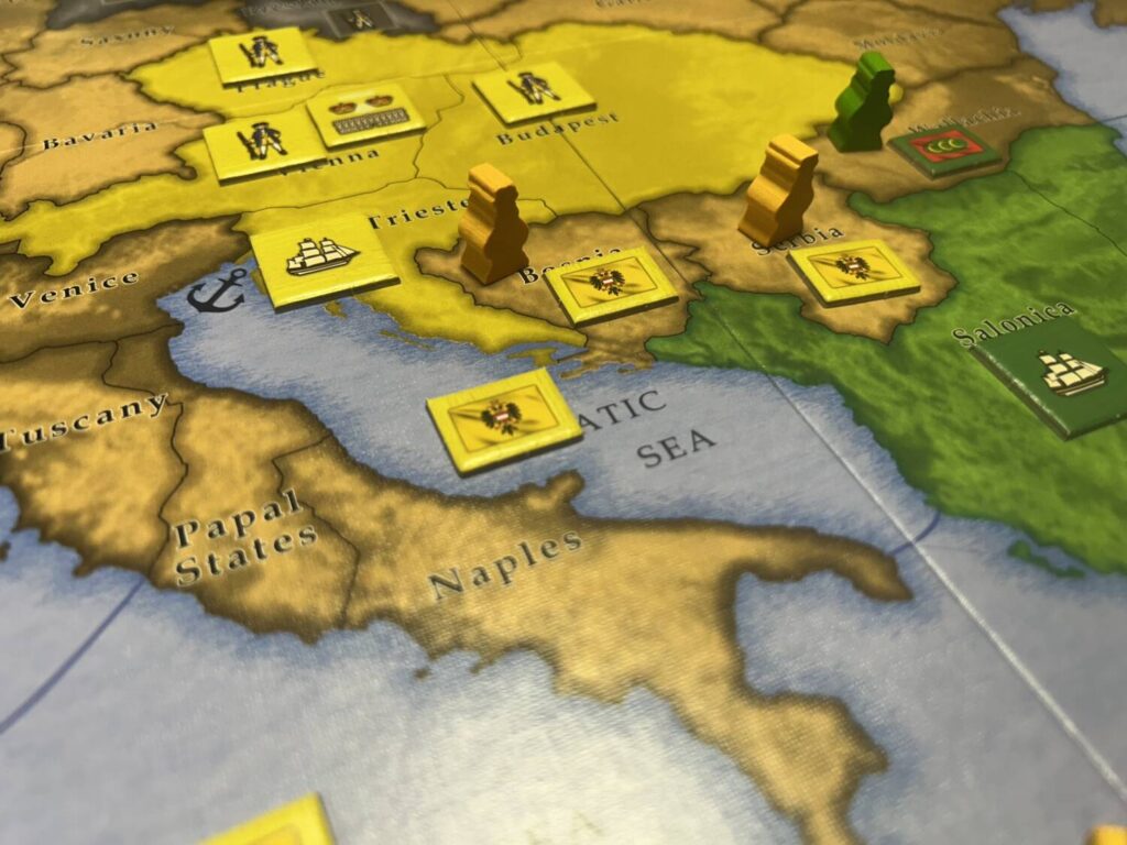 The board during play, with military units and cities populating the various districts of the board.