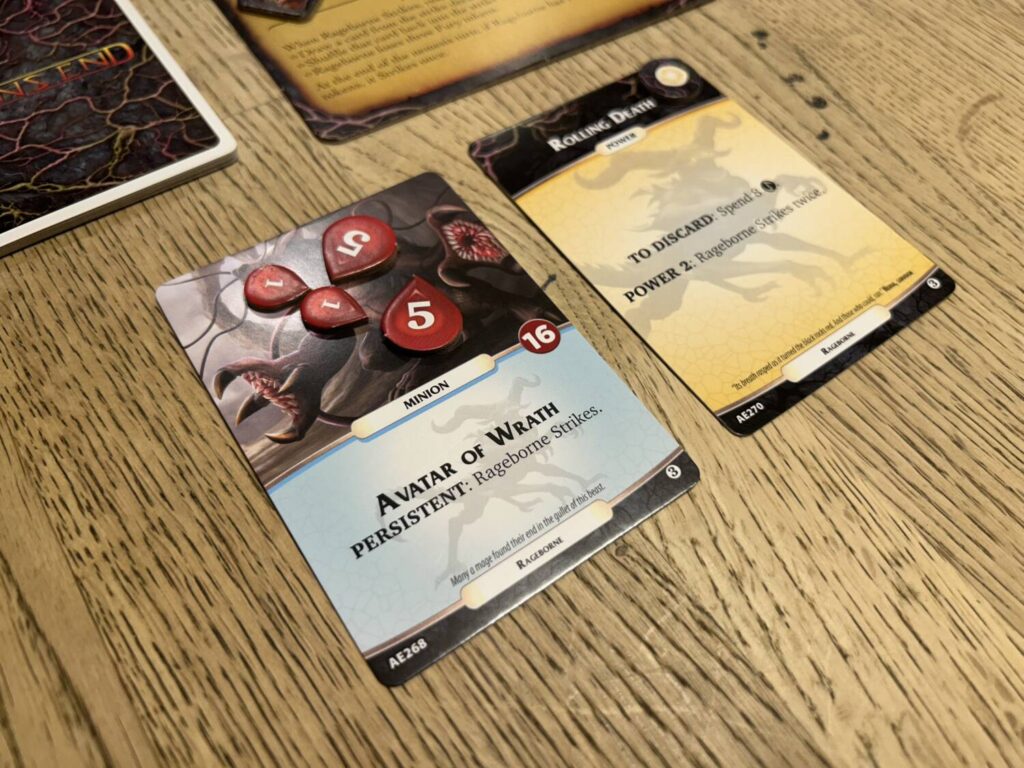 Close-up photo of two Nameless cards, each showing either a minion or an attack.