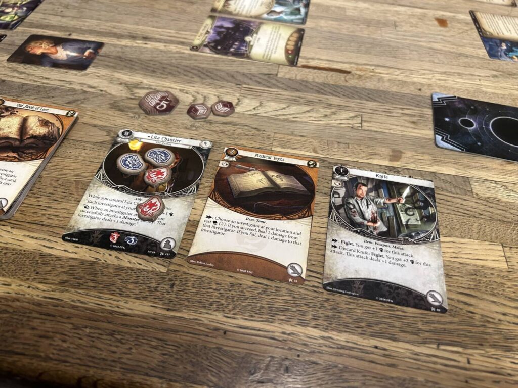 A selection of player accessories and ally cards.