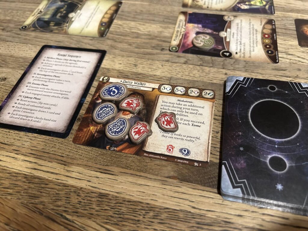 A character card covered with damage both physical and psychological damage tokens.