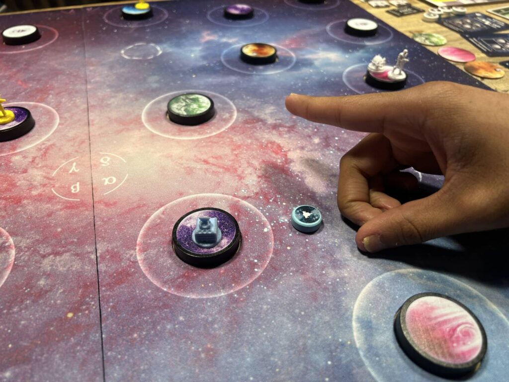 A hand on the board, mid-flick.