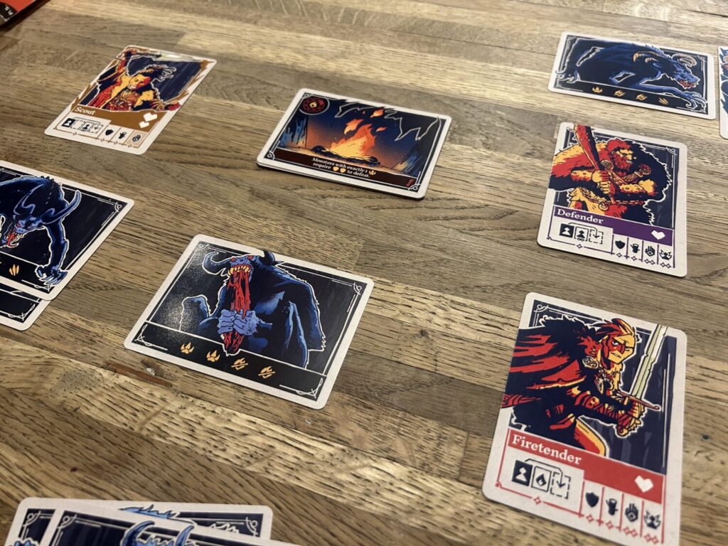 A series of cards laid out in a circle on a wooden table.