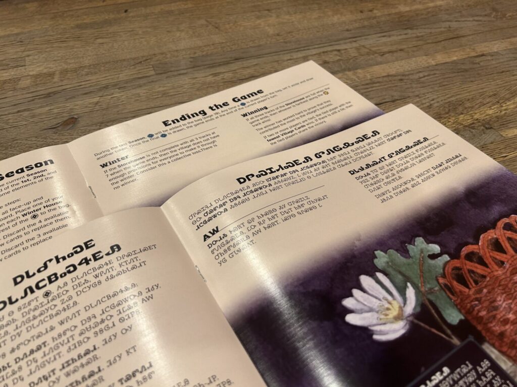 The same page in two different manuals. One is in English, the other in Cherokee.