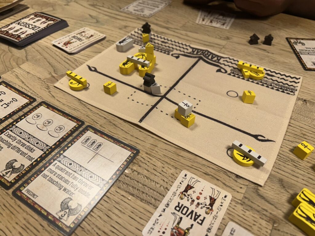 Another image of the same board, with player cards in view.