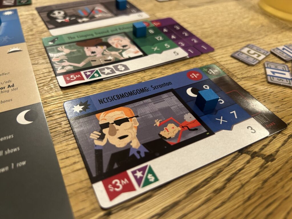 Closeup photo of three satirical TV shows.