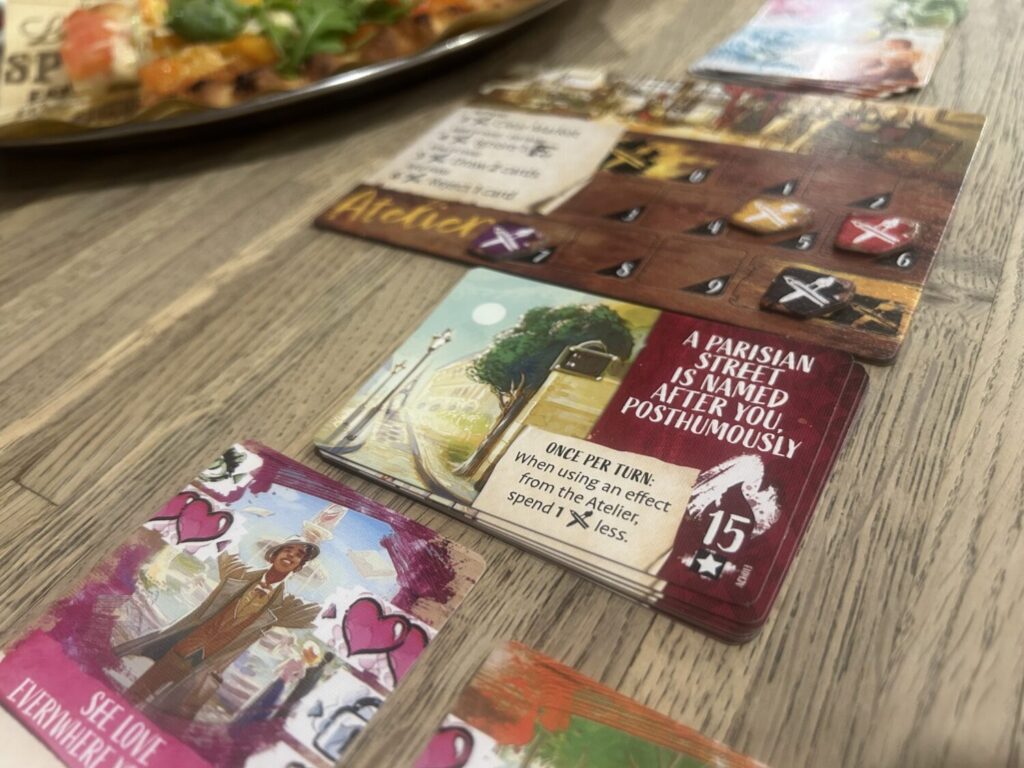 Another achievement card, "A Parisian street is named after you posthumously."