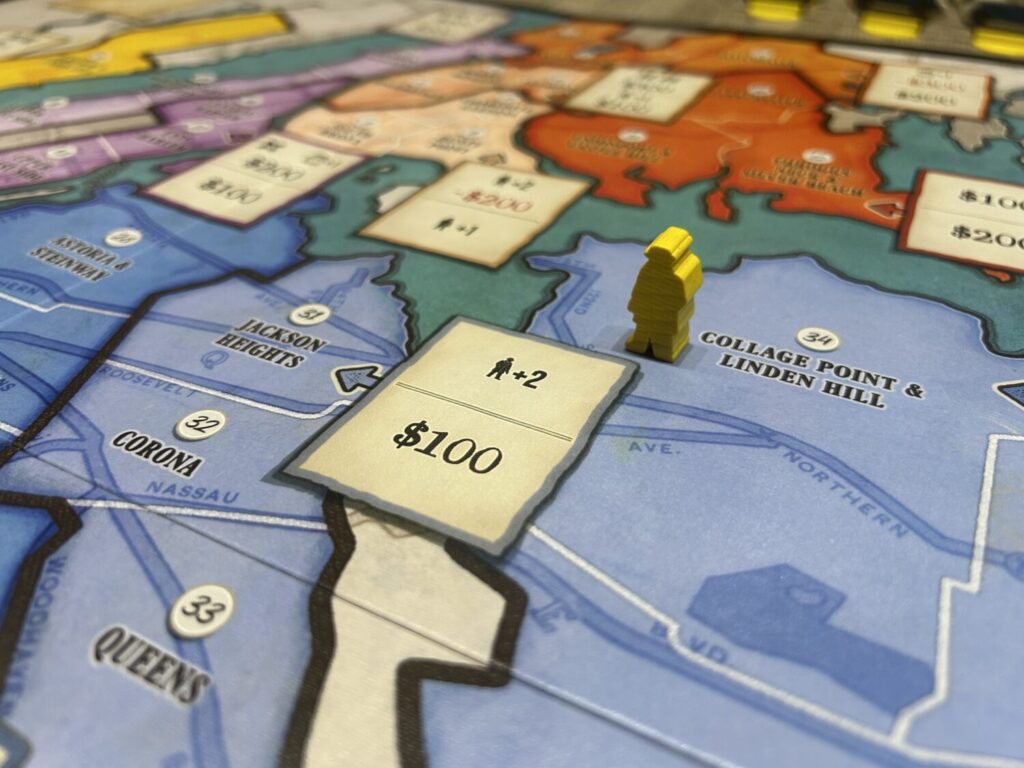 A lone yellow mobster meeple stands in Linden Hill.