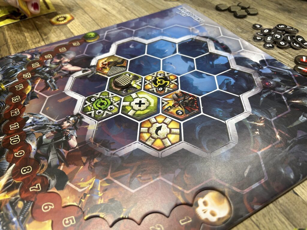 The honeycomb board, with a variety of tiles on it.