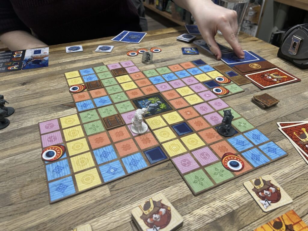 The full board, made up of four squares arranged around the edges of a smaller central garden square.