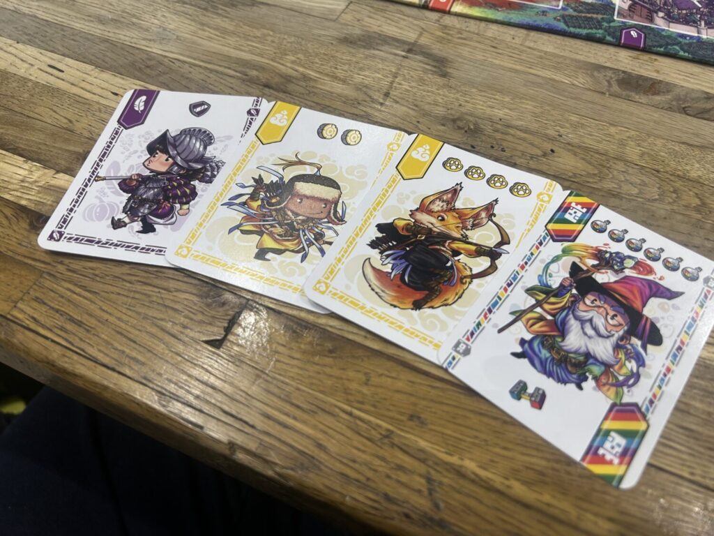 Four cards splayed on the table so you can see the adorable illustrations.