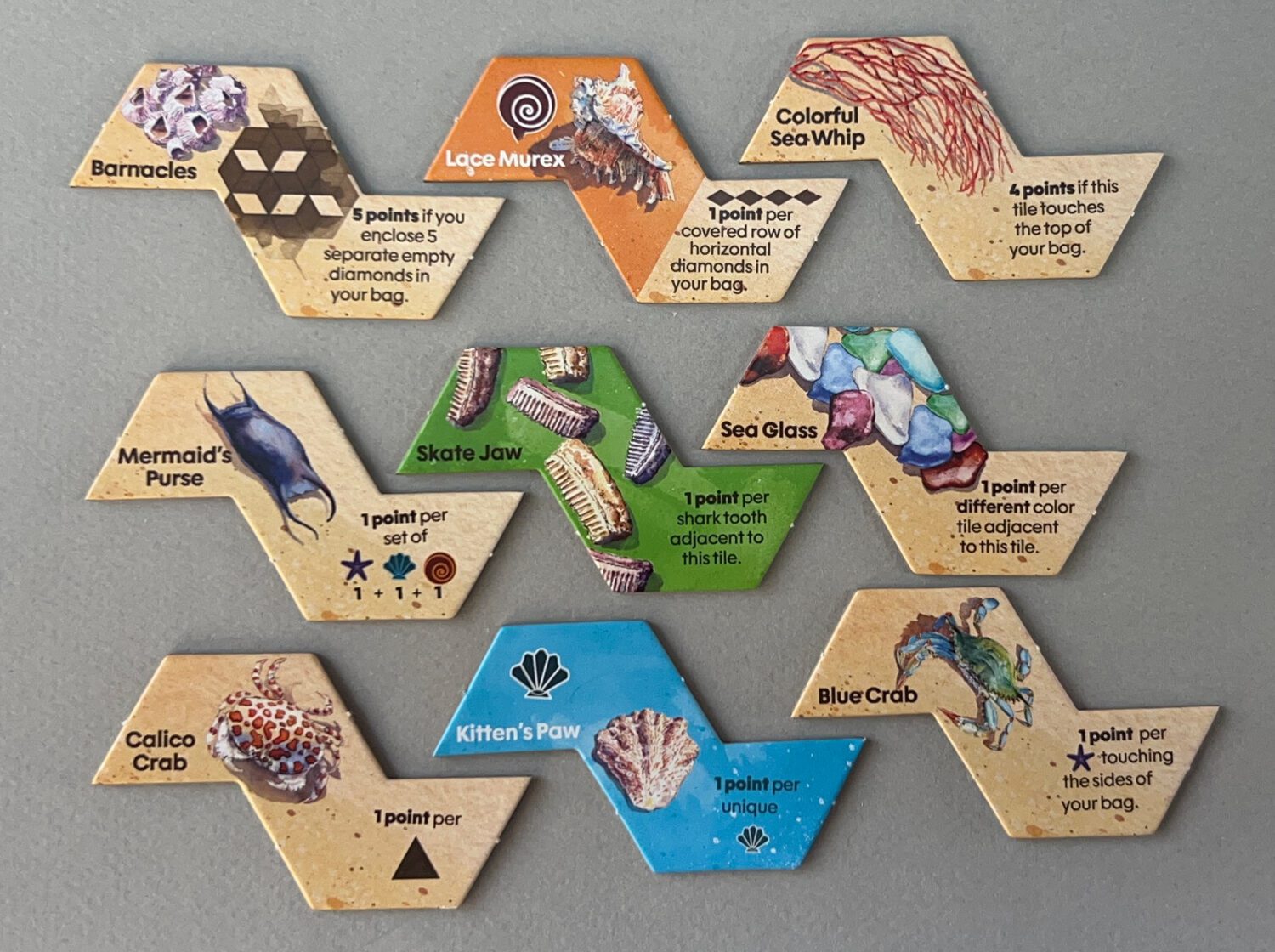 A selection of the Lighthouse tiles, each with their own extra scoring opportunities.