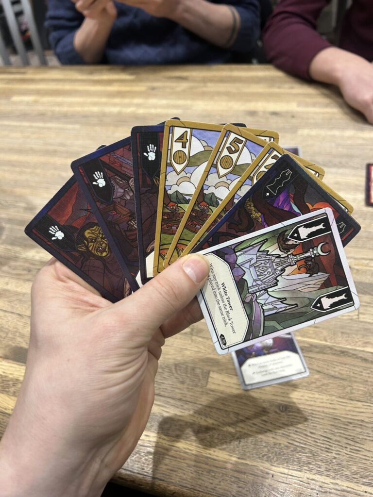 A fanned out hand of cards.