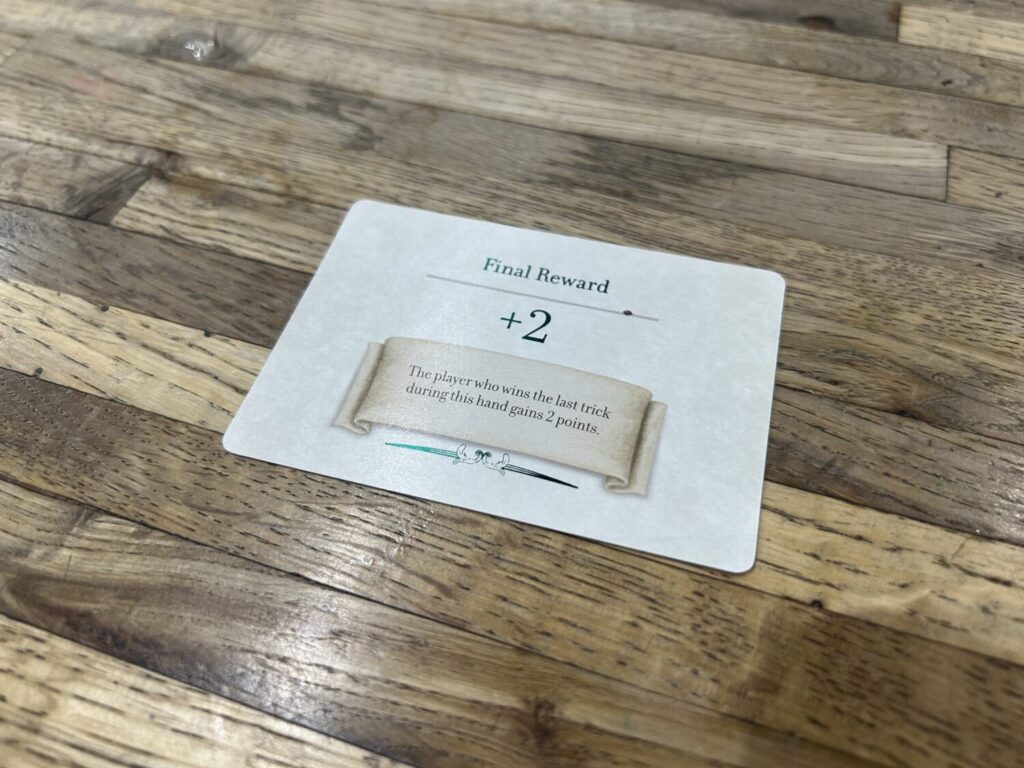 An example of a challenge card. The winner of the final trick gets two points at the end of the hand.