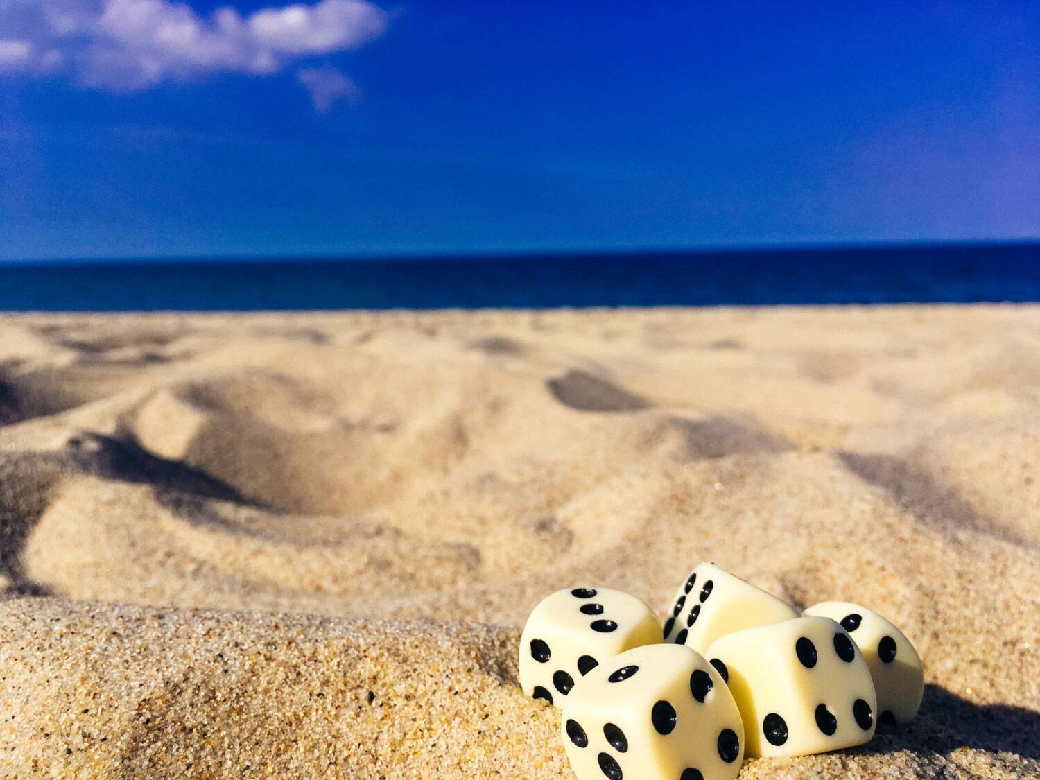 Dice on beach